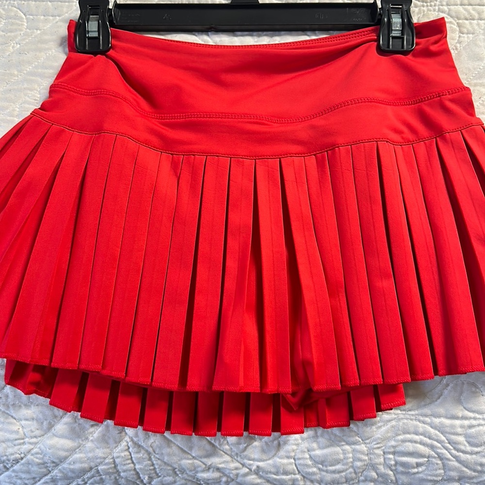 Brand New. Never Worn. Medium, Red Gold Hinge Skirt.
